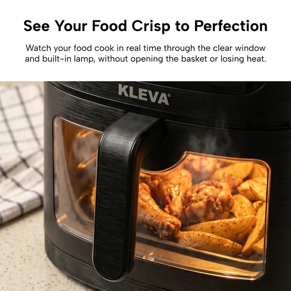 The KLEVA® SteamCrisp IQ Steam Air Fryer with Smart Food Detection 8L by Kleva Range features a transparent window with built-in lamp, showing chicken wings and potato wedges cooking as steam swirls inside above the visible handle.